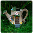 Tuinbeeld Gieter Huisje – Solar, Kunststof, 21,5x17x13cm – Sprookjesachtig Decoratief Tuinornament – Bruin & Groen
