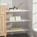 Verstelbaar opbergrek met uitschuifbare separator, kledingka